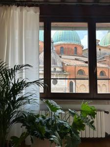 a view of a building from a window at Calmaggiore Apartment - Luxury group apartment in Treviso
