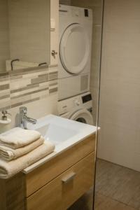 Koupelna v ubytování Brodnik Apartment + 37 fotografií