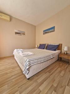 Postel nebo postele na pokoji v ubytování Family Hotel Astra
