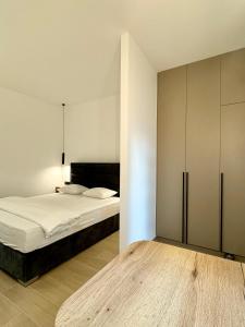 Postel nebo postele na pokoji v ubytování LUX Apartments