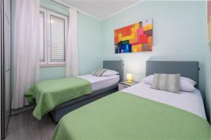 Postel nebo postele na pokoji v ubytování Apartment Jelena
