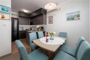 Kuchyň nebo kuchyňský kout v ubytování Apartment Jelena