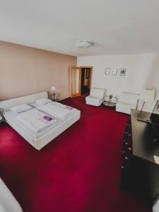 Postel nebo postele na pokoji v ubytování hotel Florian Sedlčany