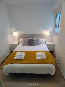 Postel nebo postele na pokoji v ubytování MiRa Los Patios