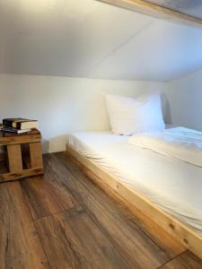 Voodi või voodid majutusasutuse Tiny House Triberg toas