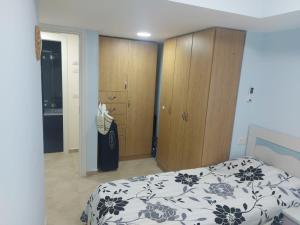 Ένα ή περισσότερα κρεβάτια σε δωμάτιο στο 3 Bedroom in Ramat Beit Shemesh +11 φωτογραφίες