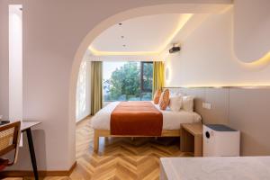 Suzhou Zhouzhuang Slowlife River View lnn客房内的一张或多张床位