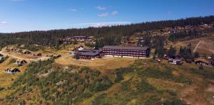 an aerial view of a building on a hill at Spåtind Fjellhotell in Nord Torpa