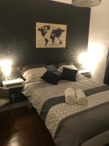 Ένα ή περισσότερα κρεβάτια σε δωμάτιο στο Le Bienvenue Chez Toi