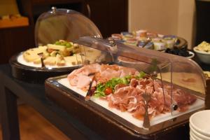 Comida no hotel ou em algum lugar perto