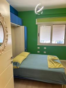 Ένα ή περισσότερα κρεβάτια σε δωμάτιο στο YOUR PERFECT SEASIDE Apartment +12 φωτογραφίες