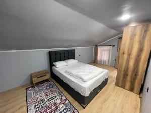 Postel nebo postele na pokoji v ubytování adora apart
