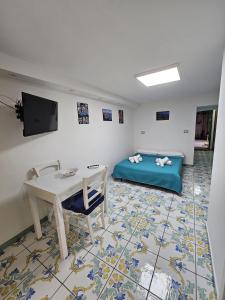 Μια τηλεόραση ή/και κέντρο ψυχαγωγίας στο DIMORA MARADONA ai QUARTIERI SPAGN0LI