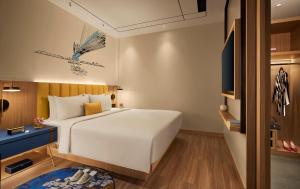 Postel nebo postele na pokoji v ubytování Hyatt Centric Ballygunge Kolkata