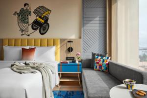 Postel nebo postele na pokoji v ubytování Hyatt Centric Ballygunge Kolkata