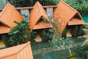 an aerial view of a house with an orange roof at Sandat Bali Villa Canggu in Canggu