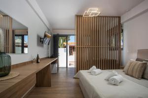 Posteľ alebo postele v izbe v ubytovaní Cactus Suites