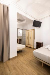 Posteľ alebo postele v izbe v ubytovaní Live in Chianti Apartaments by Concept Flats