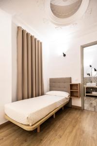 Posteľ alebo postele v izbe v ubytovaní Live in Chianti Apartaments by Concept Flats