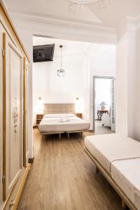 Posteľ alebo postele v izbe v ubytovaní Live in Chianti Apartaments by Concept Flats