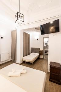 Posteľ alebo postele v izbe v ubytovaní Live in Chianti Apartaments by Concept Flats