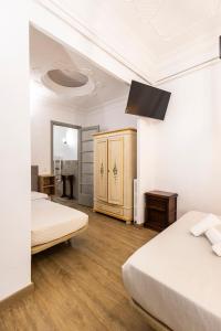 Posteľ alebo postele v izbe v ubytovaní Live in Chianti Apartaments by Concept Flats