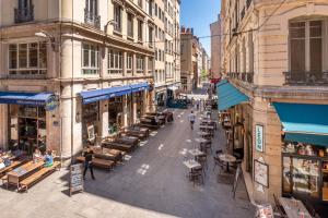 an overhead view of a street in a city with buildings at Le Carré Mercière , Appartements de Luxe au cœur de Lyon, Loft et Studio in Lyon