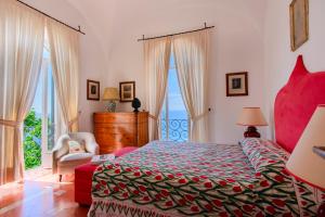 A bed or beds in a room at Villa Trara