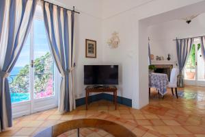 A television and/or entertainment centre at Villa Trara