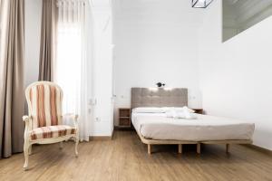 Posteľ alebo postele v izbe v ubytovaní Live in Chianti Apartaments by Concept Flats