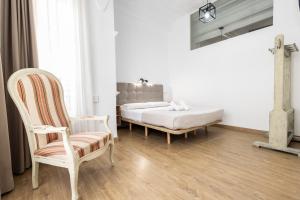 Posteľ alebo postele v izbe v ubytovaní Live in Chianti Apartaments by Concept Flats