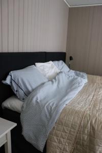Postel nebo postele na pokoji v ubytování ÖstraVi Visby 2 rok stor altan