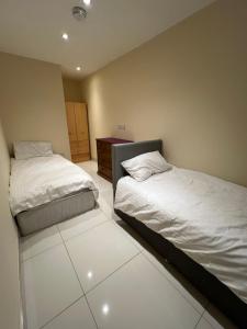 Voodi või voodid majutusasutuse Lovely Dublin Home - Just 15 Mins to City Centre toas