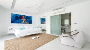 Ένα ή περισσότερα κρεβάτια σε δωμάτιο στο Villa Murano - Luxury with Panoramic Sea Views +49 φωτογραφίες