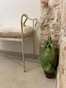 Postel nebo postele na pokoji v ubytování Il Trullo di Bina