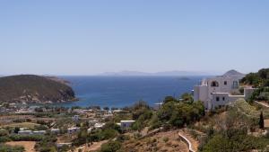 a view of a town and the ocean at Lavender Studio in Patmos