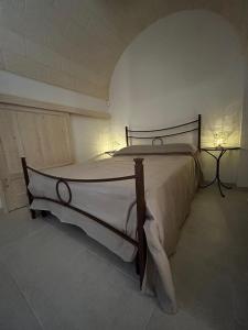 Postel nebo postele na pokoji v ubytování Il Trullo di Bina
