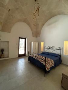 Postel nebo postele na pokoji v ubytování Il Trullo di Bina + 37 fotografií