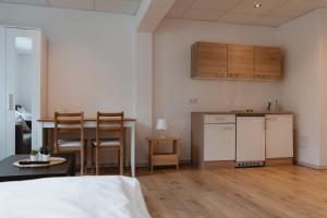 Kuchyň nebo kuchyňský kout v ubytování Kalkalpen Apartments