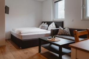 Postel nebo postele na pokoji v ubytování Kalkalpen Apartments