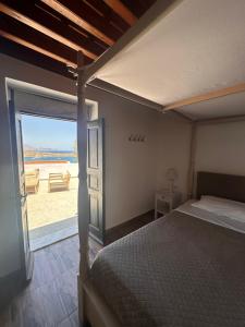 Posteľ alebo postele v izbe v ubytovaní Elegant-Lindian Villa Marietta