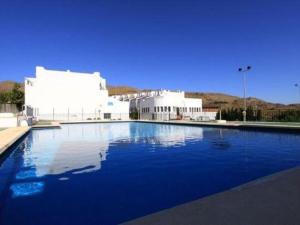 Bazén v ubytování Duplex Turisticos MojaMar Playa nebo v jeho okolí