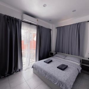 Postel nebo postele na pokoji v ubytování Shaka Guest House