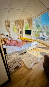 Postel nebo postele na pokoji v ubytování Glamping Casas Eco Natura