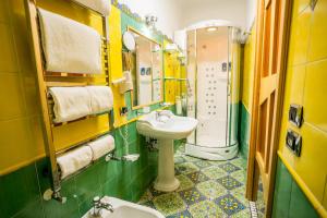 a bathroom with a sink and a shower at Il Principe Resort in Agerola