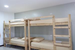 Postel nebo postele na pokoji v ubytování Borj Hotel