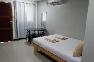 Postel nebo postele na pokoji v ubytování Borj Hotel