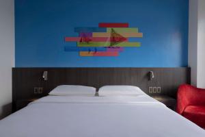 Postel nebo postele na pokoji v ubytování Park Inn By Radisson Iloilo