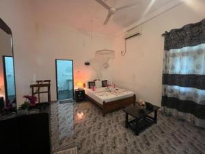 Postel nebo postele na pokoji v ubytování Dream Villa Sigiriya