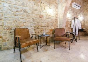 Area soggiorno di Napoleon suites